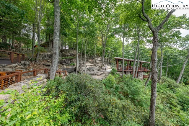 a garden view with a seating space