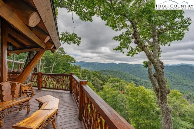 a view of balcony with furniture