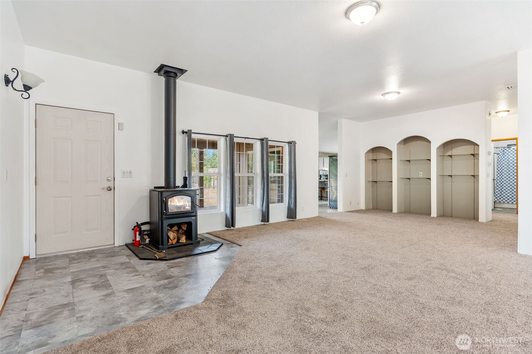 1332 Centralia Alpha Road Chehalis, WA 98532 - Photo 12 of 40 a view of a livingroom with a flat screen tv