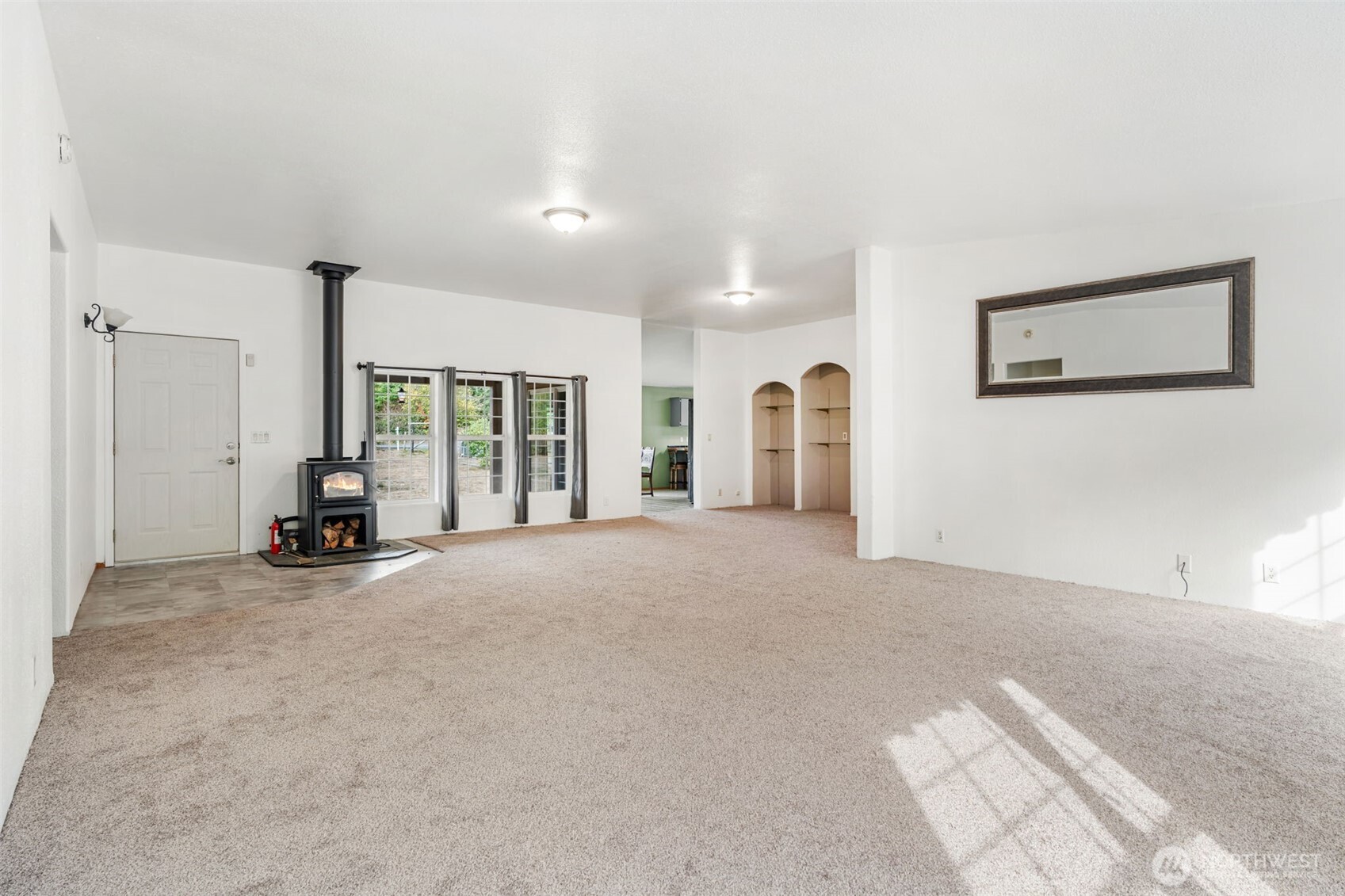 1332 Centralia Alpha Road Chehalis, WA 98532 - Photo 13 of 40 a view of a livingroom with furniture and floor to ceiling window