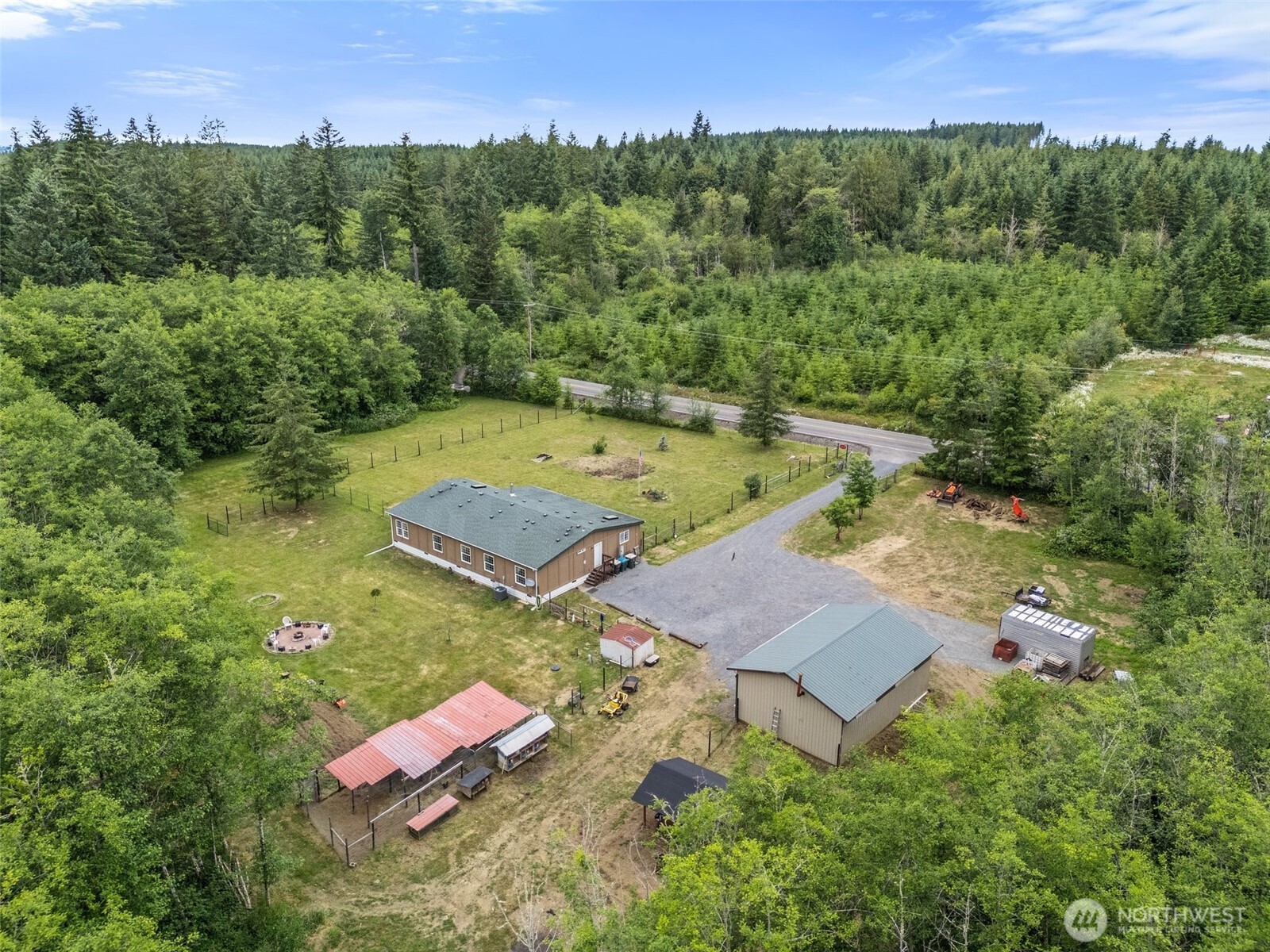 1332 Centralia Alpha Road Chehalis, WA 98532 - Photo 37 of 40 an aerial view of a house with pool