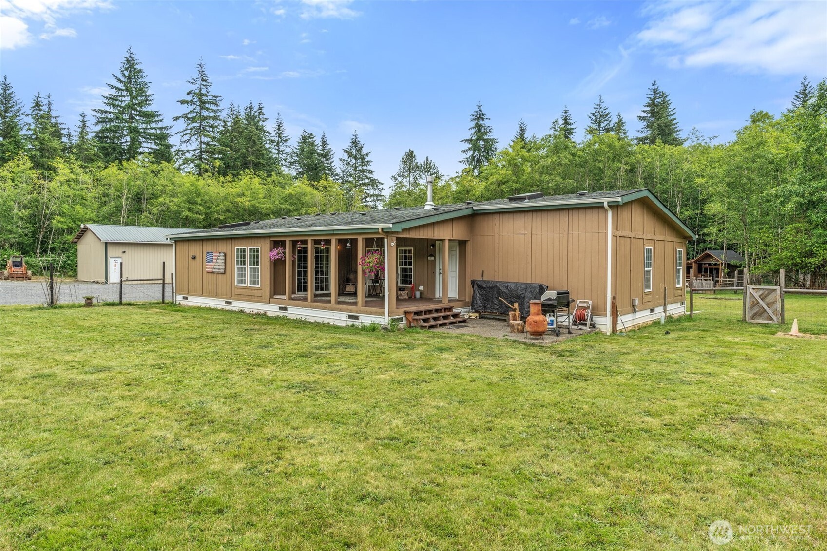 1332 Centralia Alpha Road Chehalis, WA 98532 - Photo 4 of 40 a view of a house with backyard and sitting area