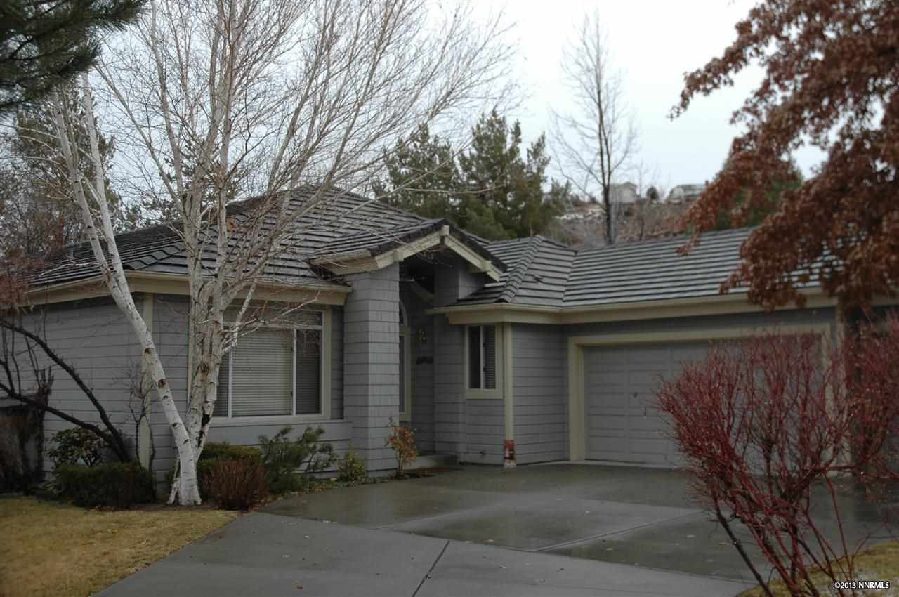 3830 Chinook Creek Road Reno, NV 89519 - Photo 1 of 1 a front view of a house with garage