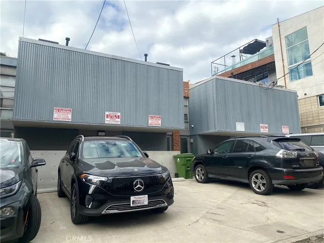 a car parked in front of a house