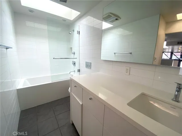 a bathroom with a sink and a bathtub