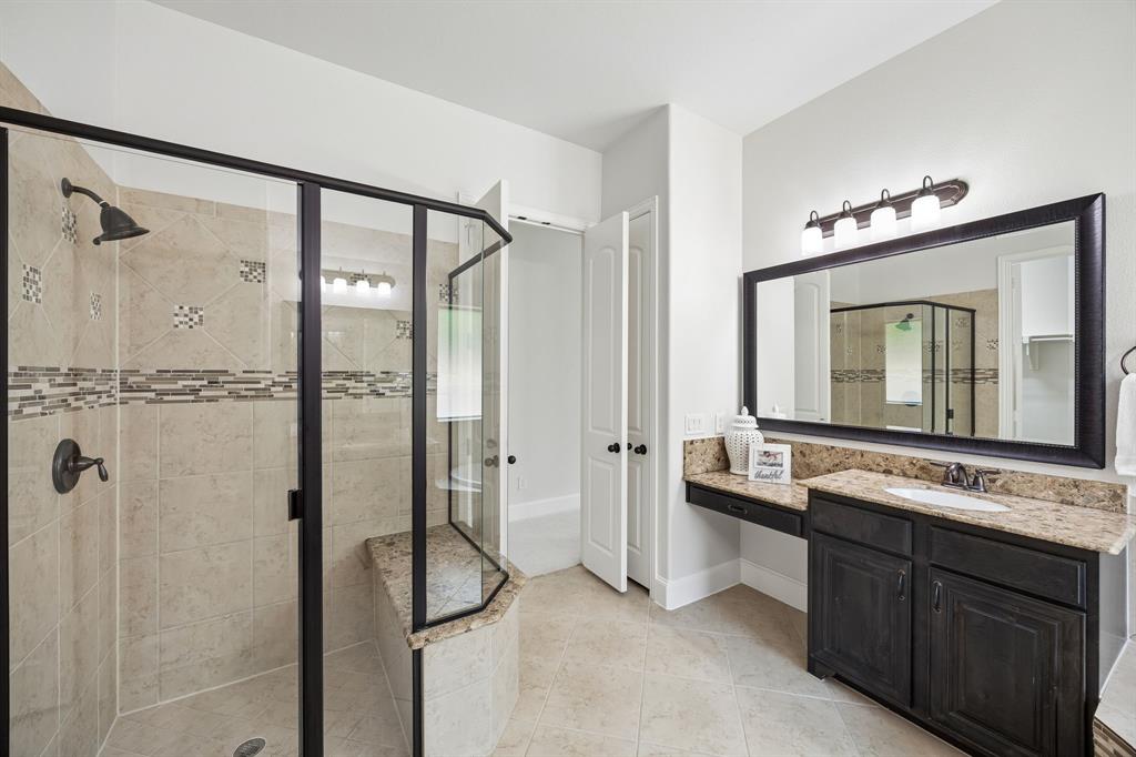 1567 Red Rock Canyon Road Frisco, TX 75036 - Photo 21 of 36 Generous shower with built in seat.