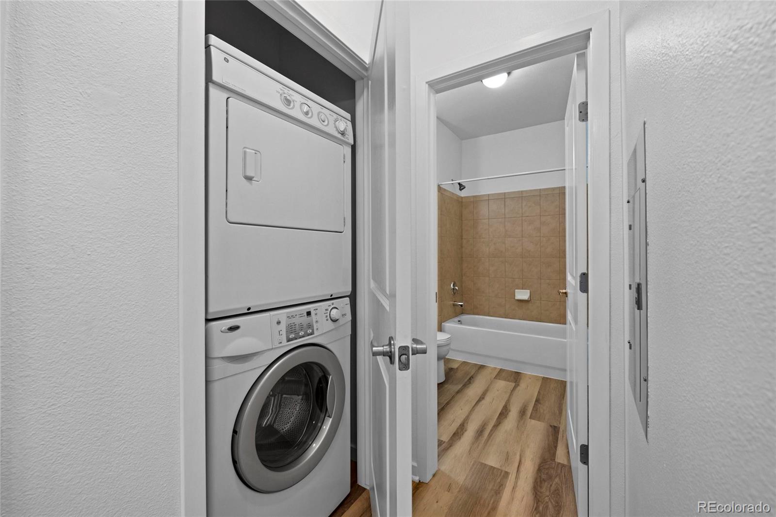 4100 Albion Street, Unit 320 Denver, CO 80216 - Photo 22 of 45 a view of a bathroom with washing machine