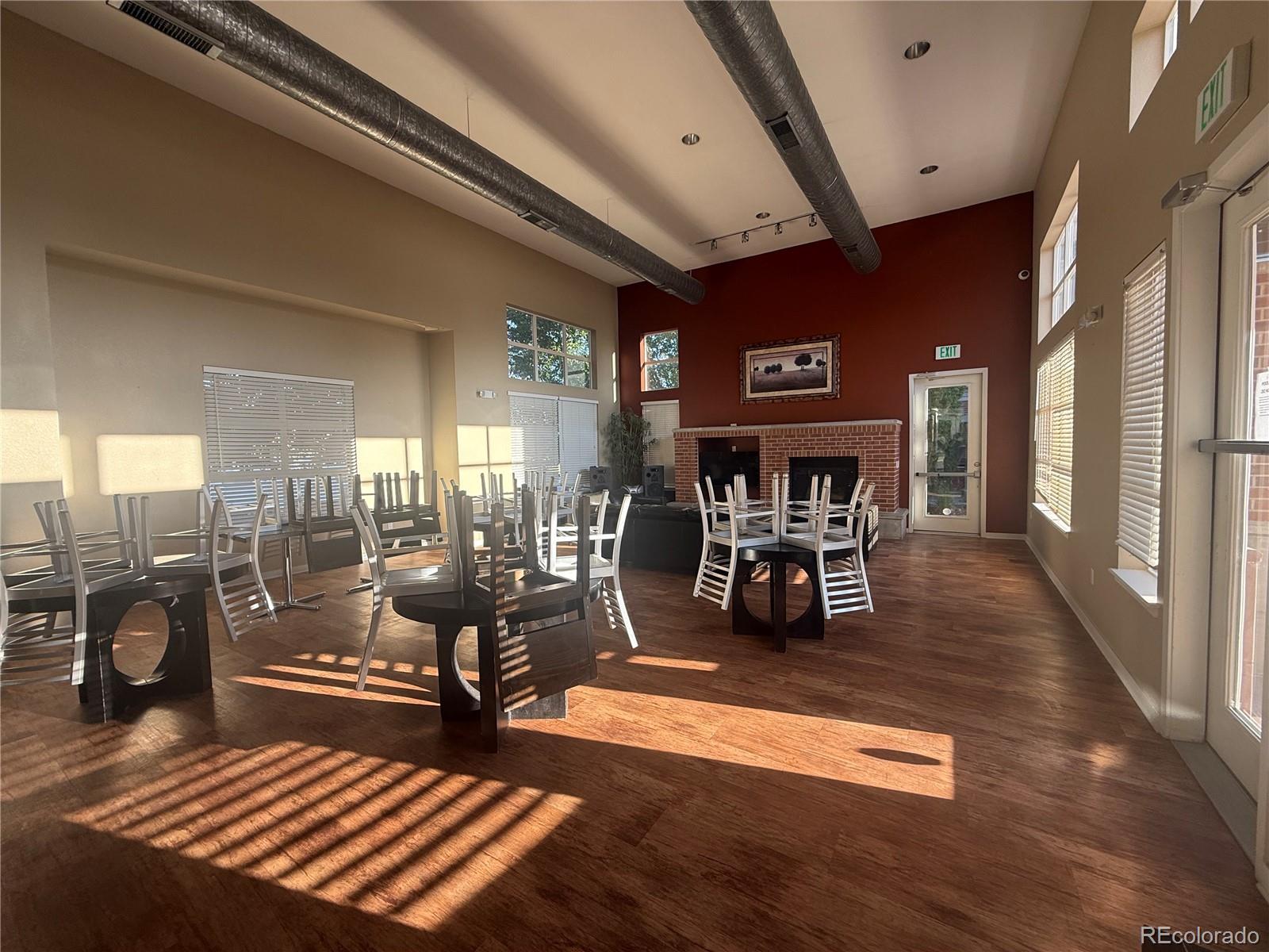 4100 Albion Street, Unit 320 Denver, CO 80216 - Photo 38 of 45 a living room with furniture and a fireplace