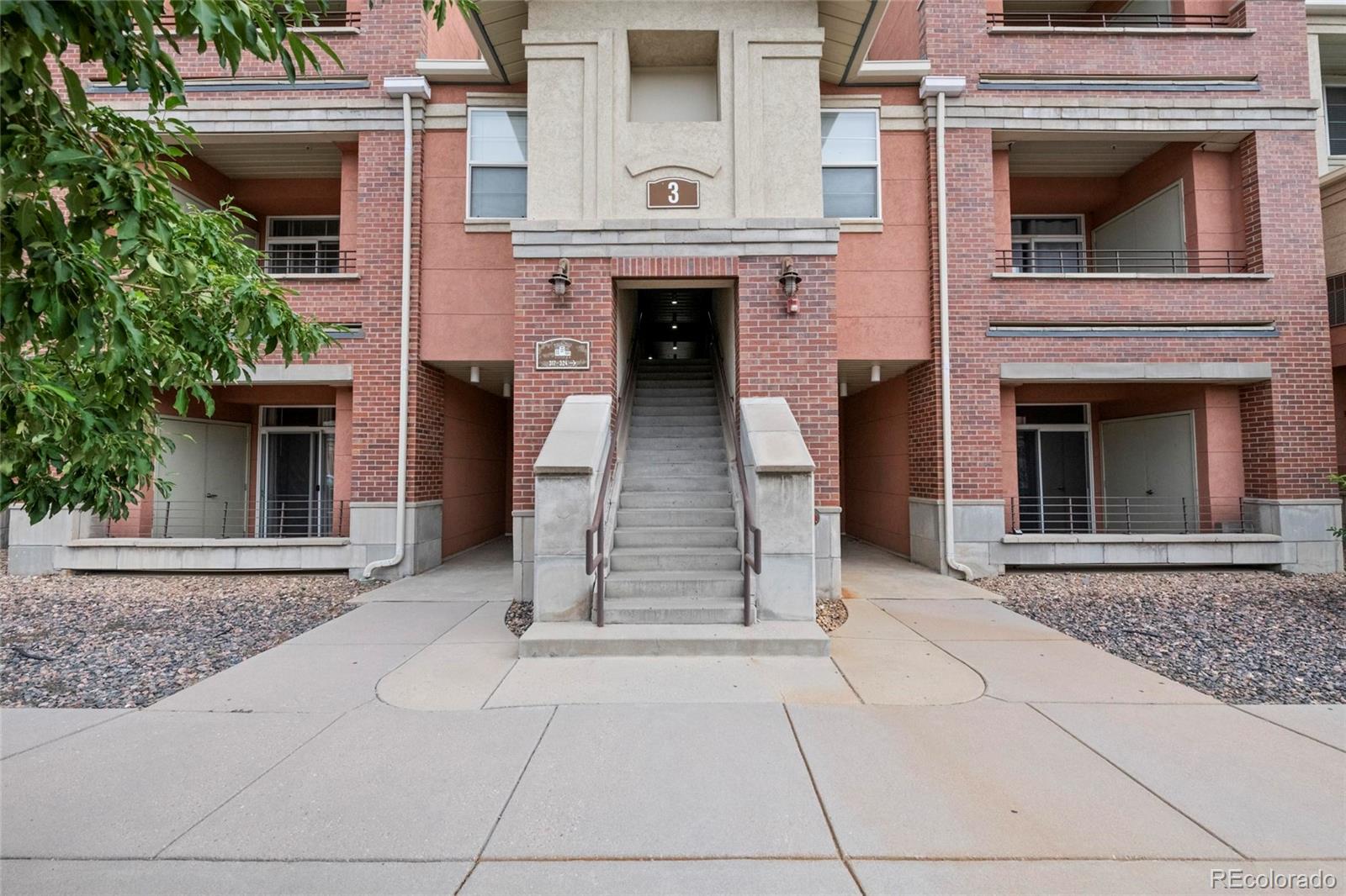 4100 Albion Street, Unit 320 Denver, CO 80216 - Photo 40 of 45 front view of a house with a door