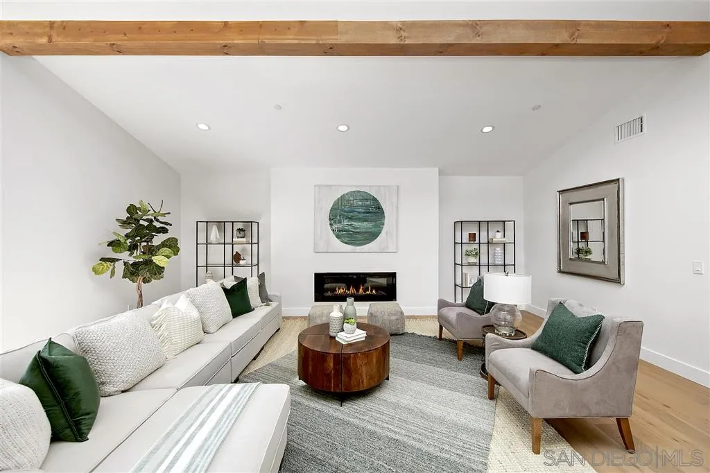 17502 Rancho Del Rio Rancho Santa Fe, CA 92067 - Photo 17 of 20 a living room with furniture and a fireplace