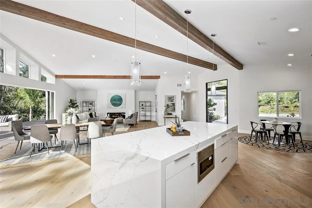 17502 Rancho Del Rio Rancho Santa Fe, CA 92067 - Photo 3 of 20 a view of a dining room with furniture window and outside view