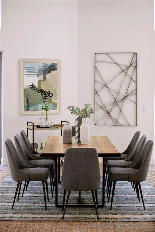 17502 Rancho Del Rio Rancho Santa Fe, CA 92067 - Photo 7 of 20 a view of a dining room with furniture