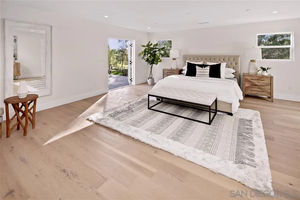 17502 Rancho Del Rio Rancho Santa Fe, CA 92067 - Photo 9 of 20 a living room with furniture and a potted plant