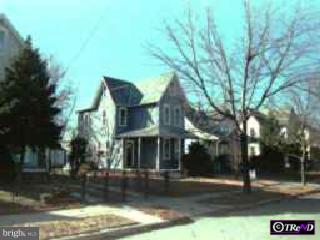 320 Delaware Avenue Riverside, NJ 08075 - Photo 1 of 1 a front view of a house with a yard