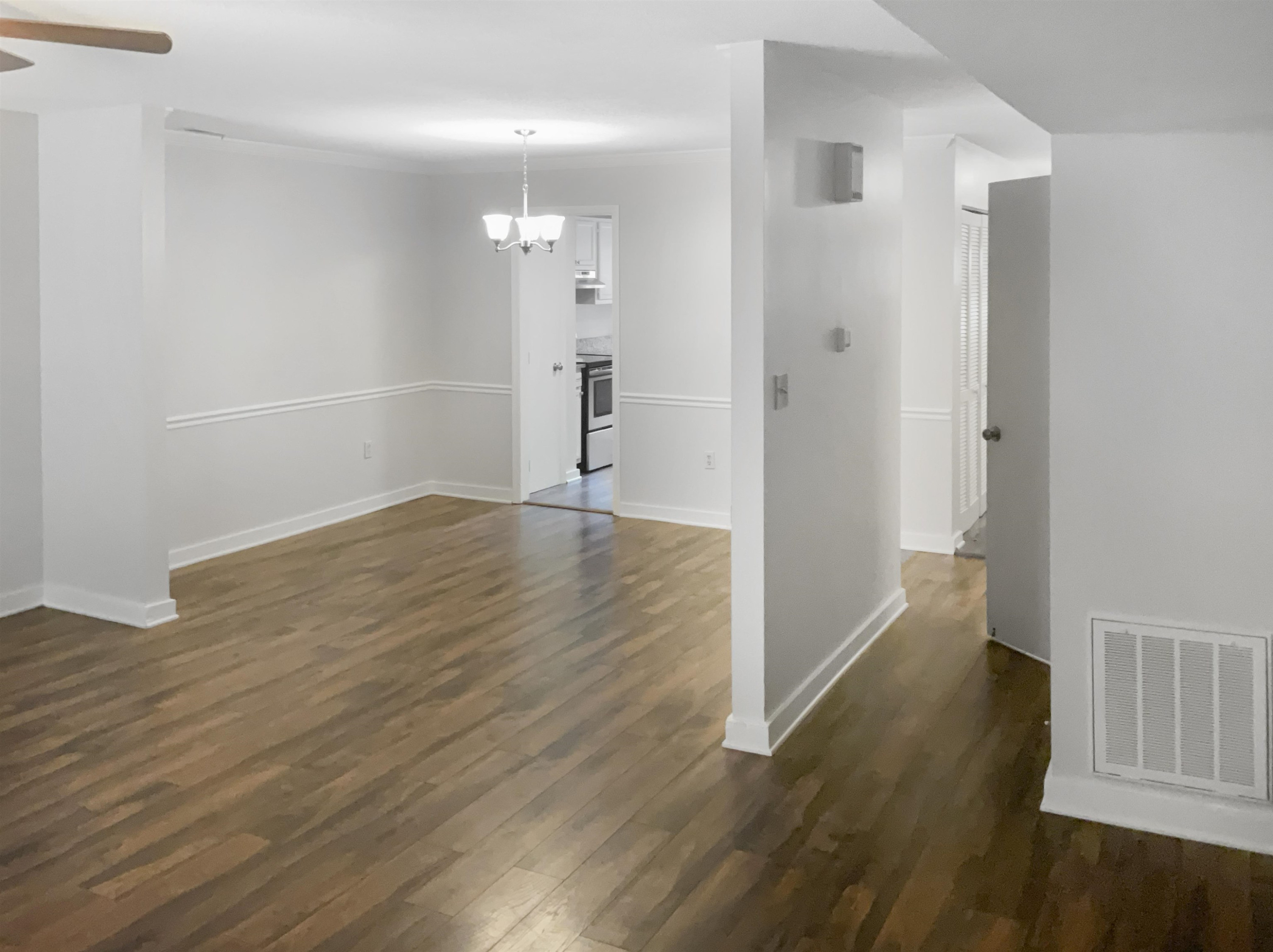 46 Willow Bridge Drive Durham, NC 27707 - Photo 12 of 29 a view of a hallway with wooden floor
