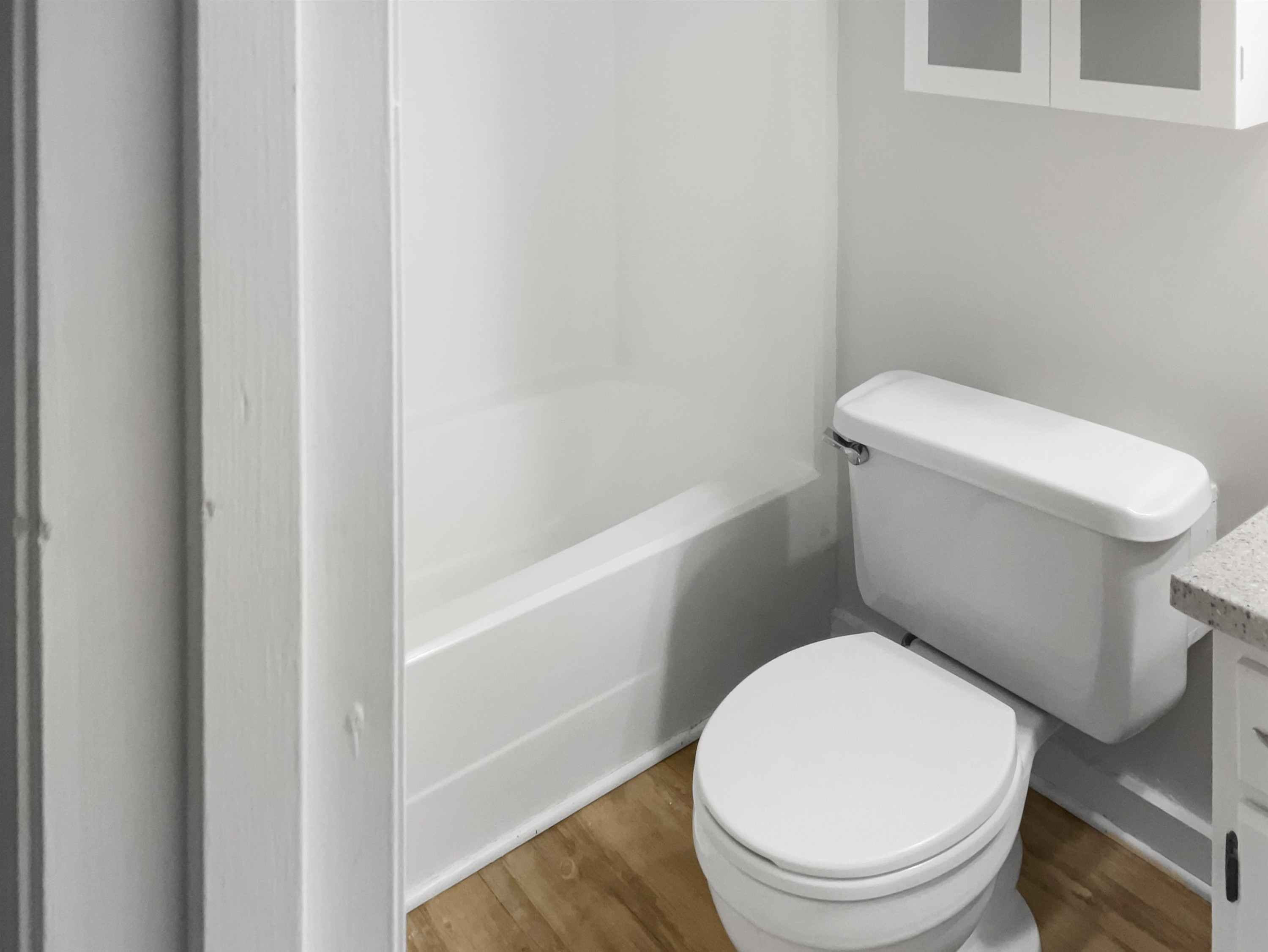 46 Willow Bridge Drive Durham, NC 27707 - Photo 21 of 29 a white toilet sitting next to a bath tub