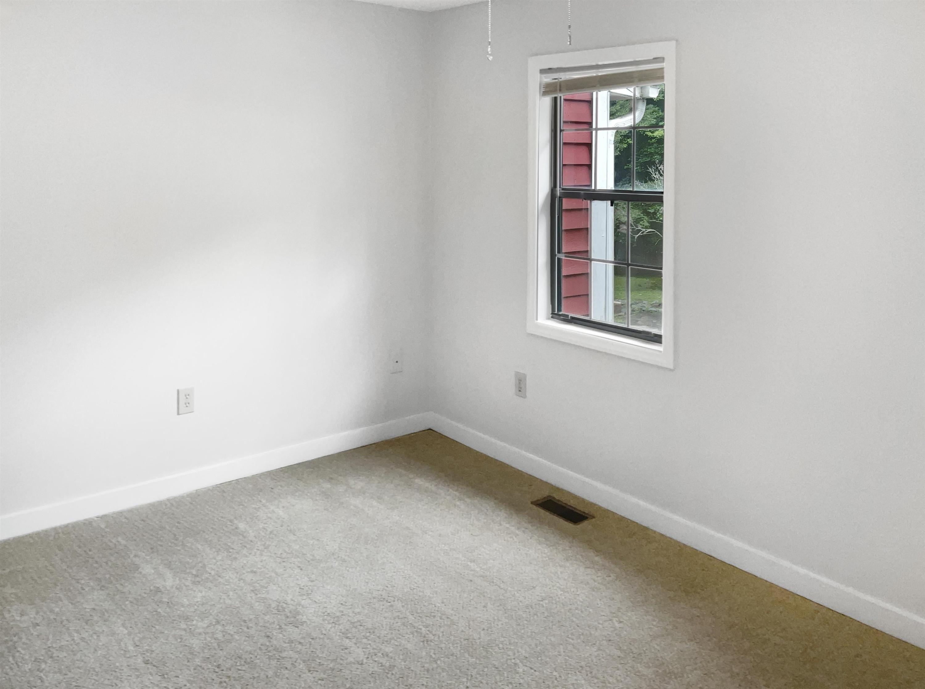 46 Willow Bridge Drive Durham, NC 27707 - Photo 24 of 29 an empty room with a window