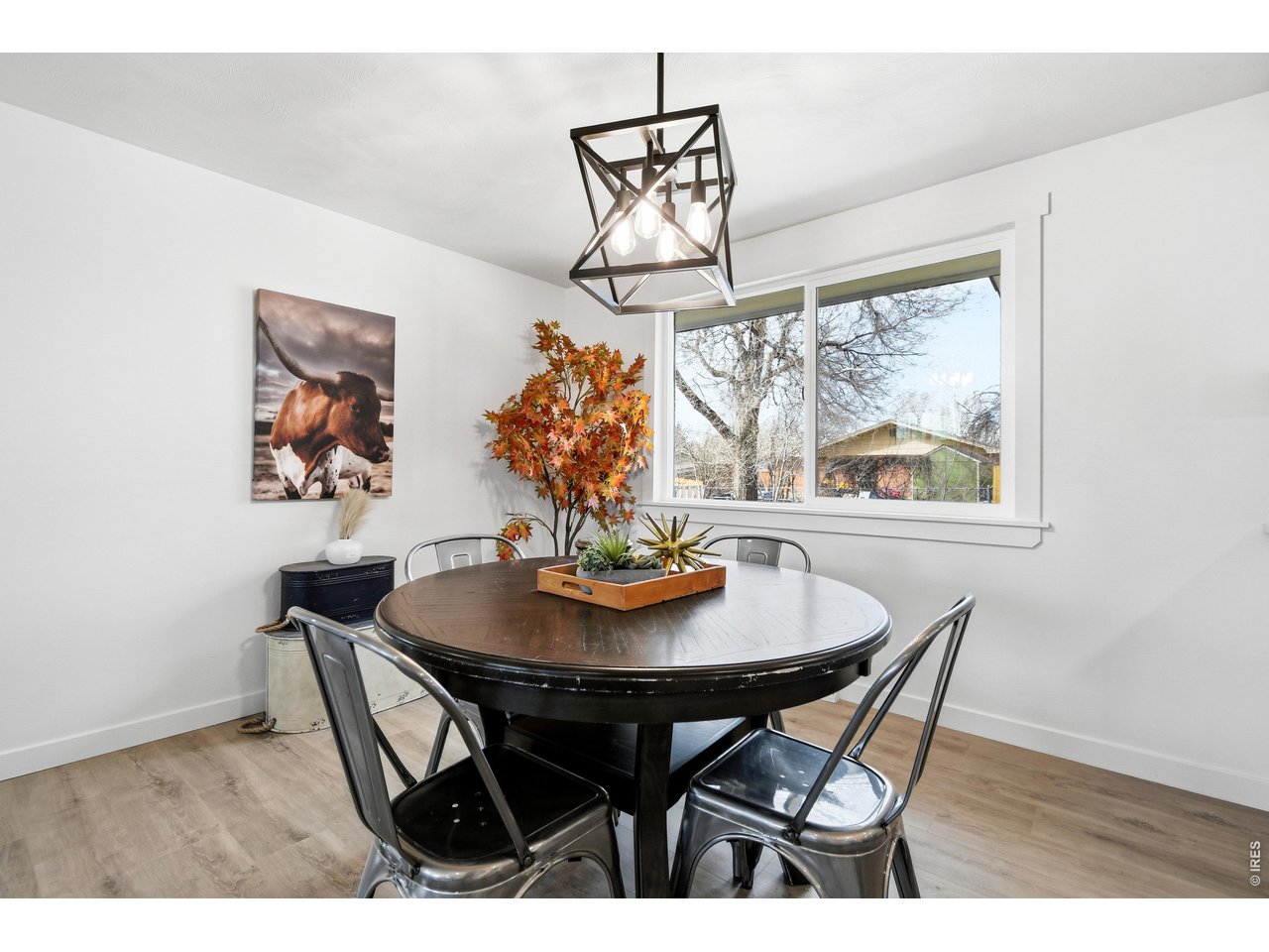 1239 Sunset Street Longmont, CO 80501 - Photo 16 of 34 a dining room with furniture and window