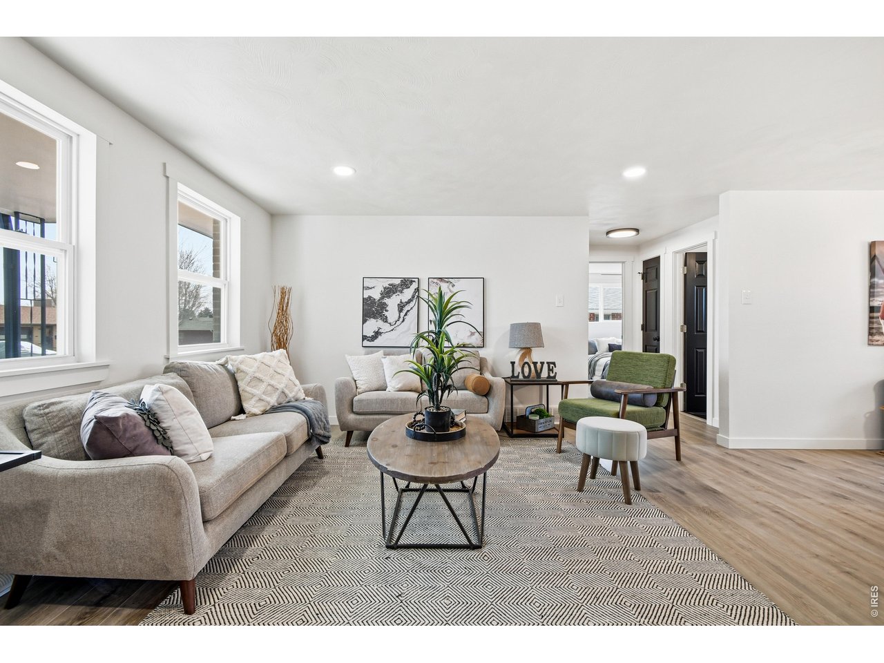 1239 Sunset Street Longmont, CO 80501 - Photo 4 of 34 a living room with furniture and wooden floor