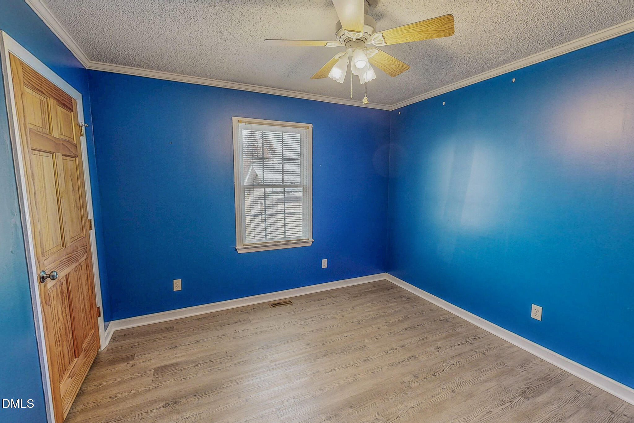 111 Fox Crossing Drive Roxboro, NC 27574 - Photo 17 of 25 an empty room with windows and fan