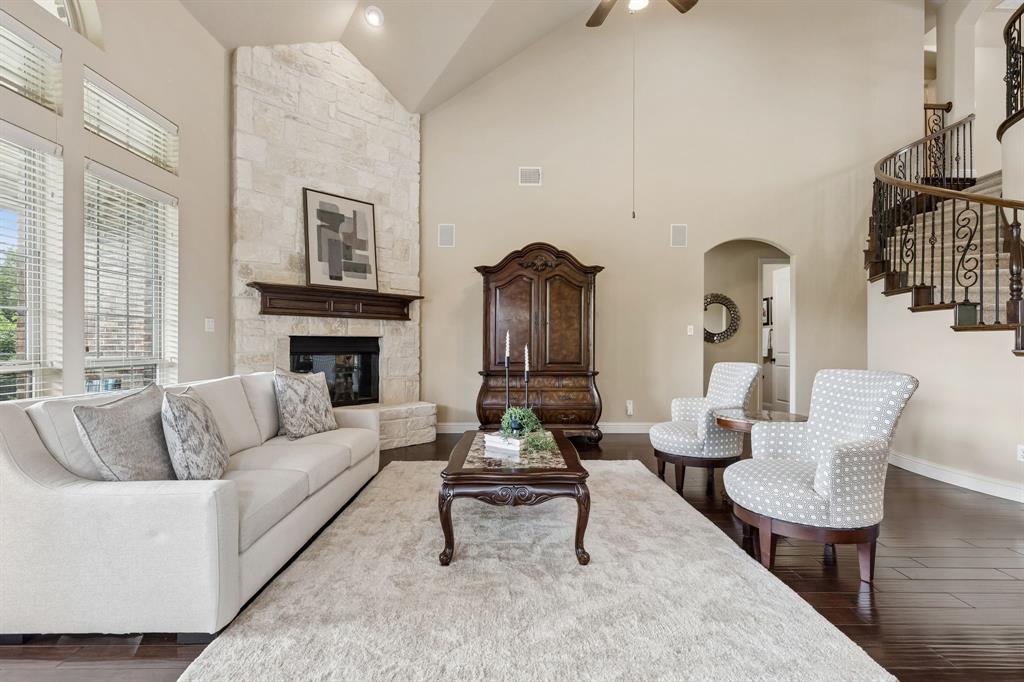 2701 Brunswick Cove Trophy Club, TX 76262 - Photo 12 of 40 a living room with furniture and a fireplace