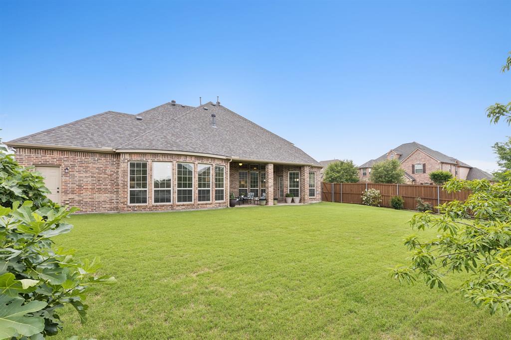 2701 Brunswick Cove Trophy Club, TX 76262 - Photo 36 of 40 a house with swimming pool in front of it