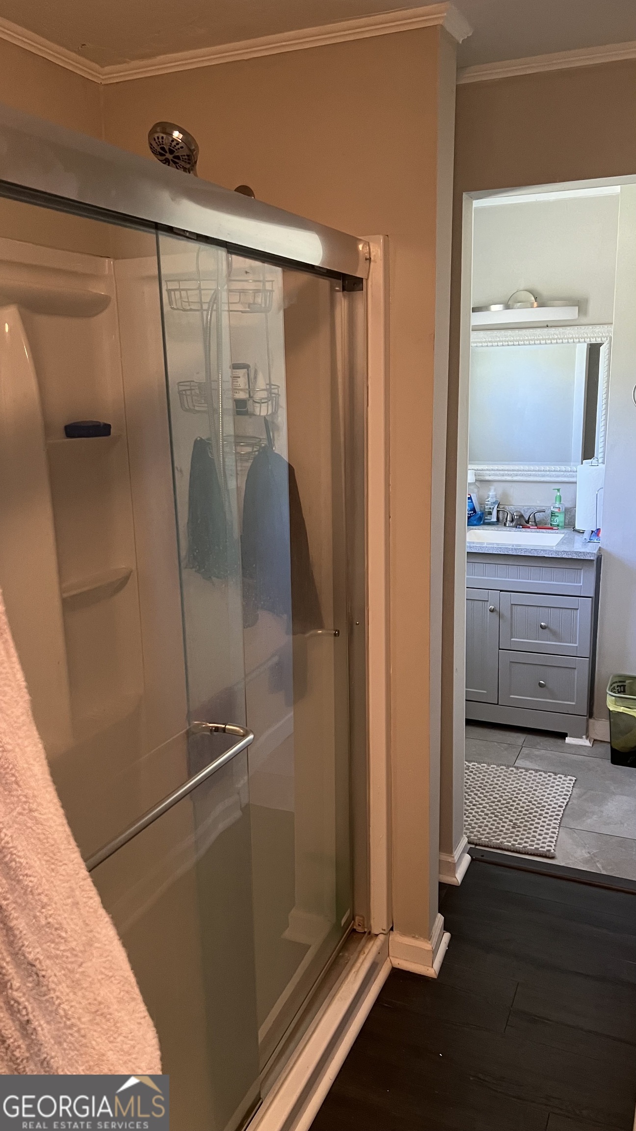 1065 Nathan Jones Road Harlem, GA 30814 - Photo 21 of 32 a bathroom with a glass shower door and a sink