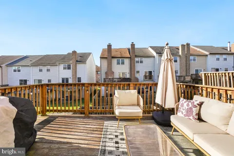 a view of a balcony with couches