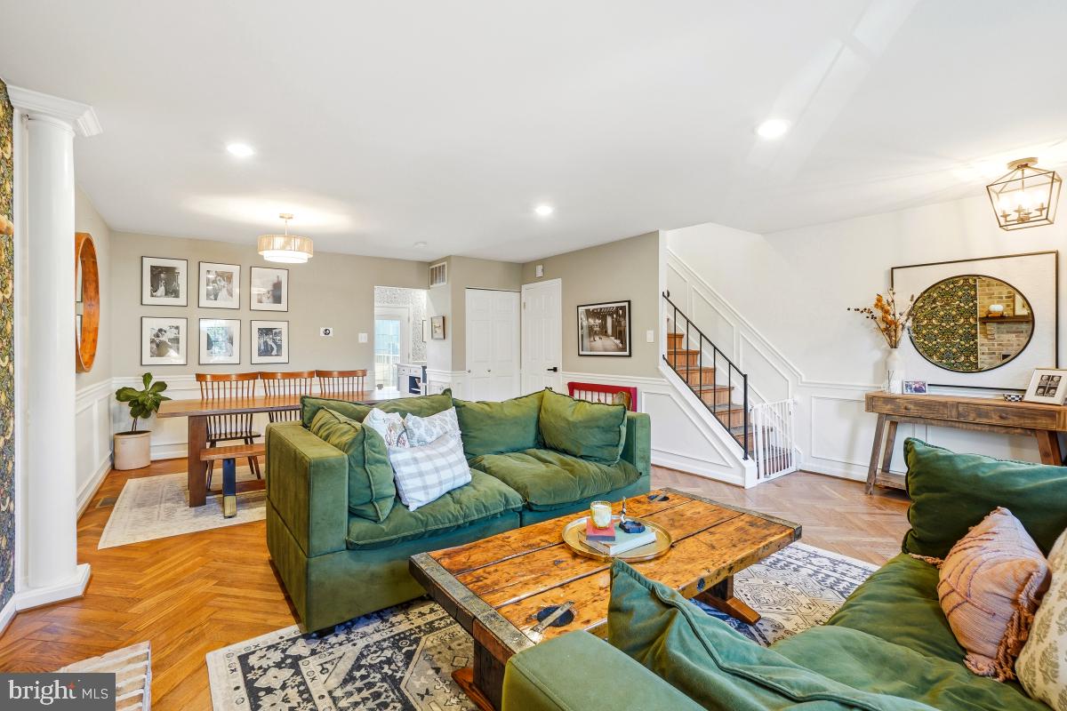 5712 Richardson Mews Square Halethorpe, MD 21227 - Photo 7 of 29 a living room with furniture and a table