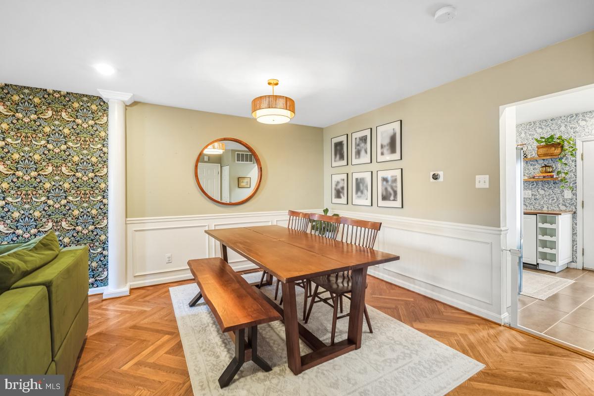 5712 Richardson Mews Square Halethorpe, MD 21227 - Photo 8 of 29 a view of a dining room with furniture and a table
