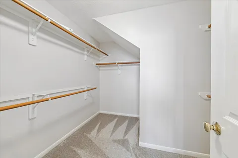 a view of a room with racks on the wall