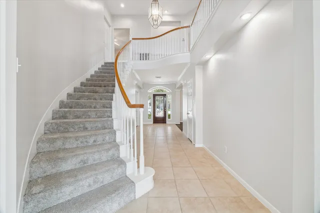 a view of staircase with white walls and white walls
