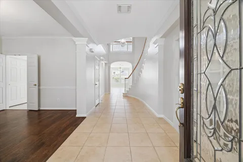 a view of entryway with wooden floor