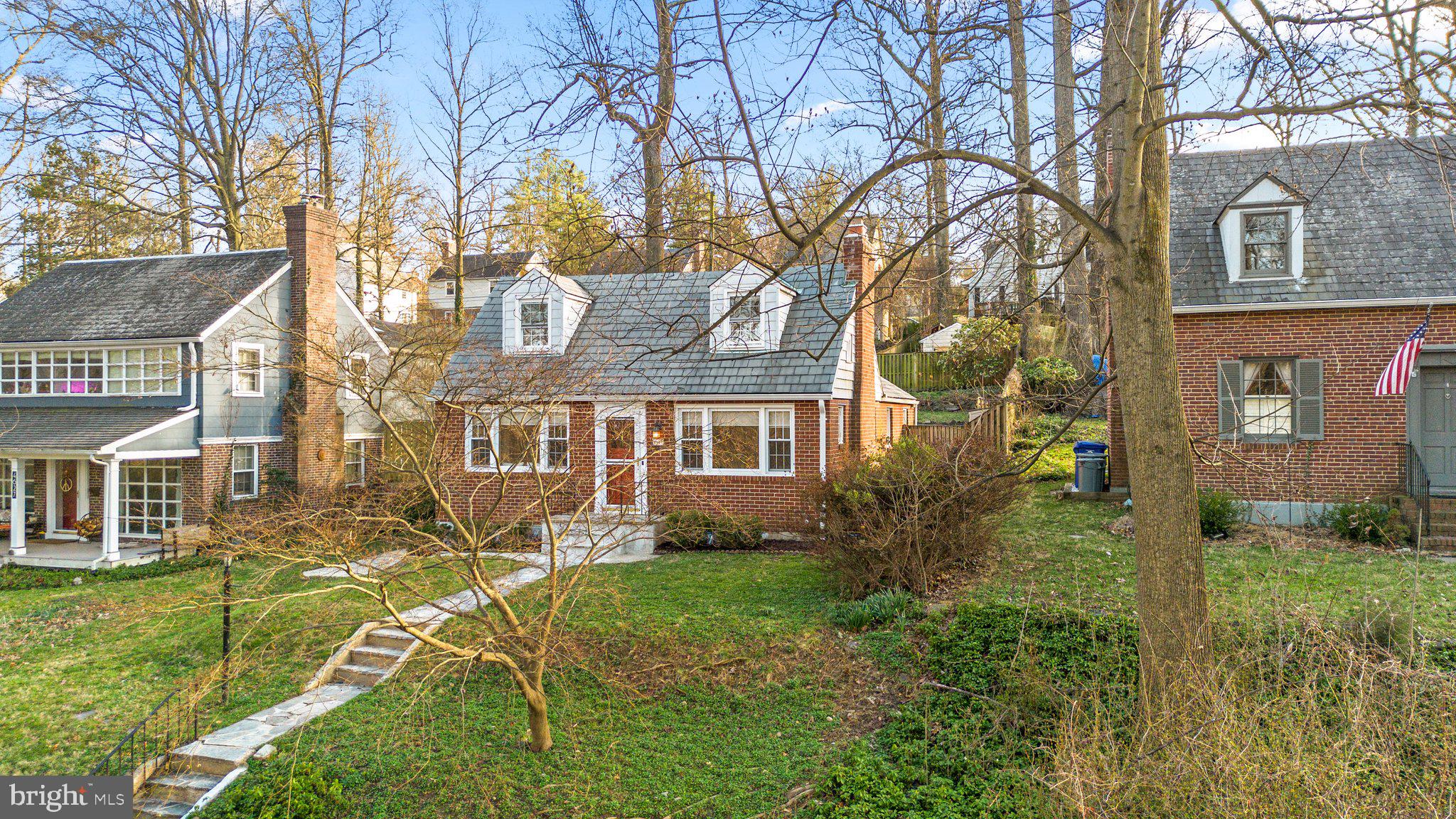 Gorgeous multi-tiered yard in front/rear.