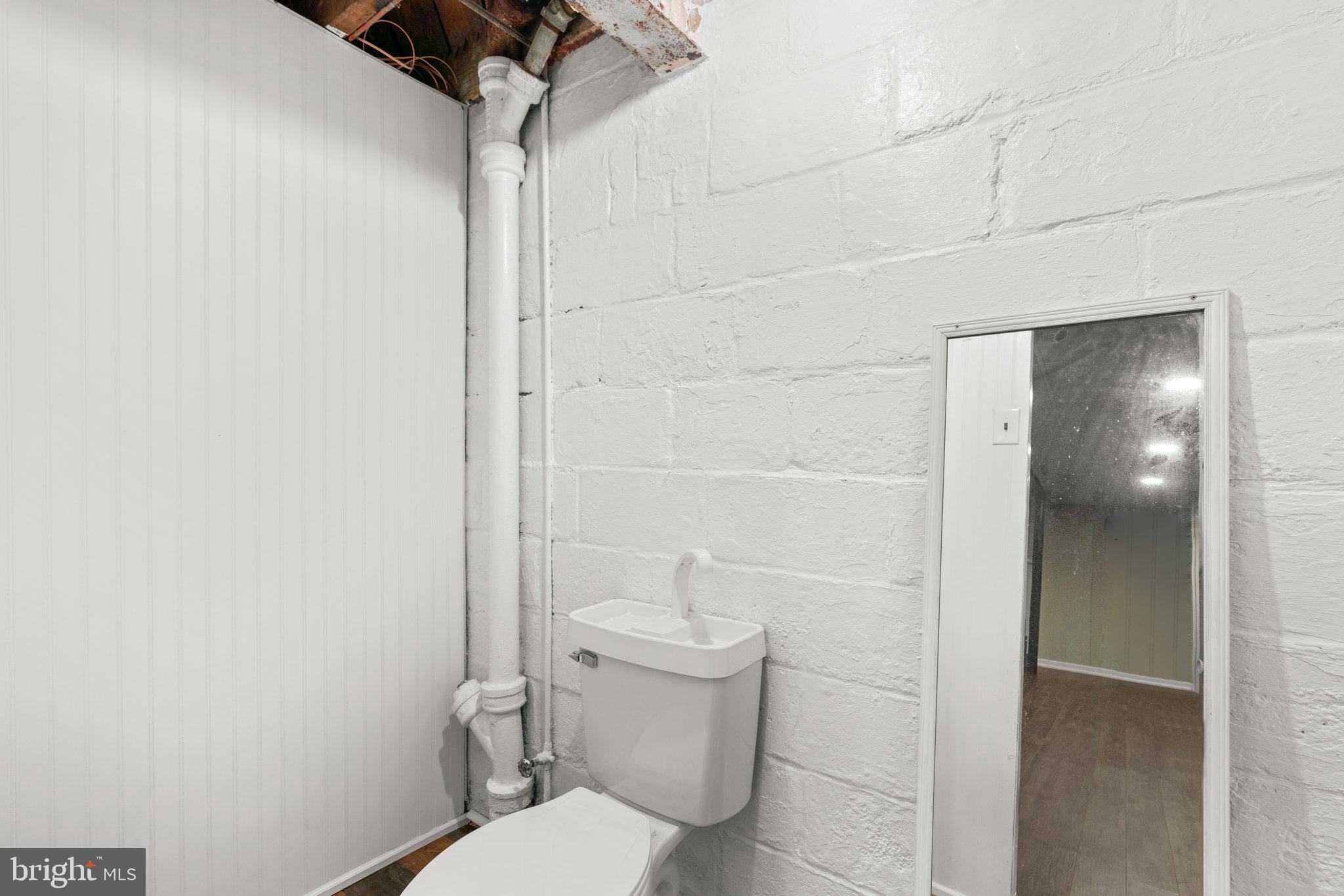 4629 Briarclift Road Baltimore, MD 21229 - Photo 43 of 65 Lower level; half bathroom.