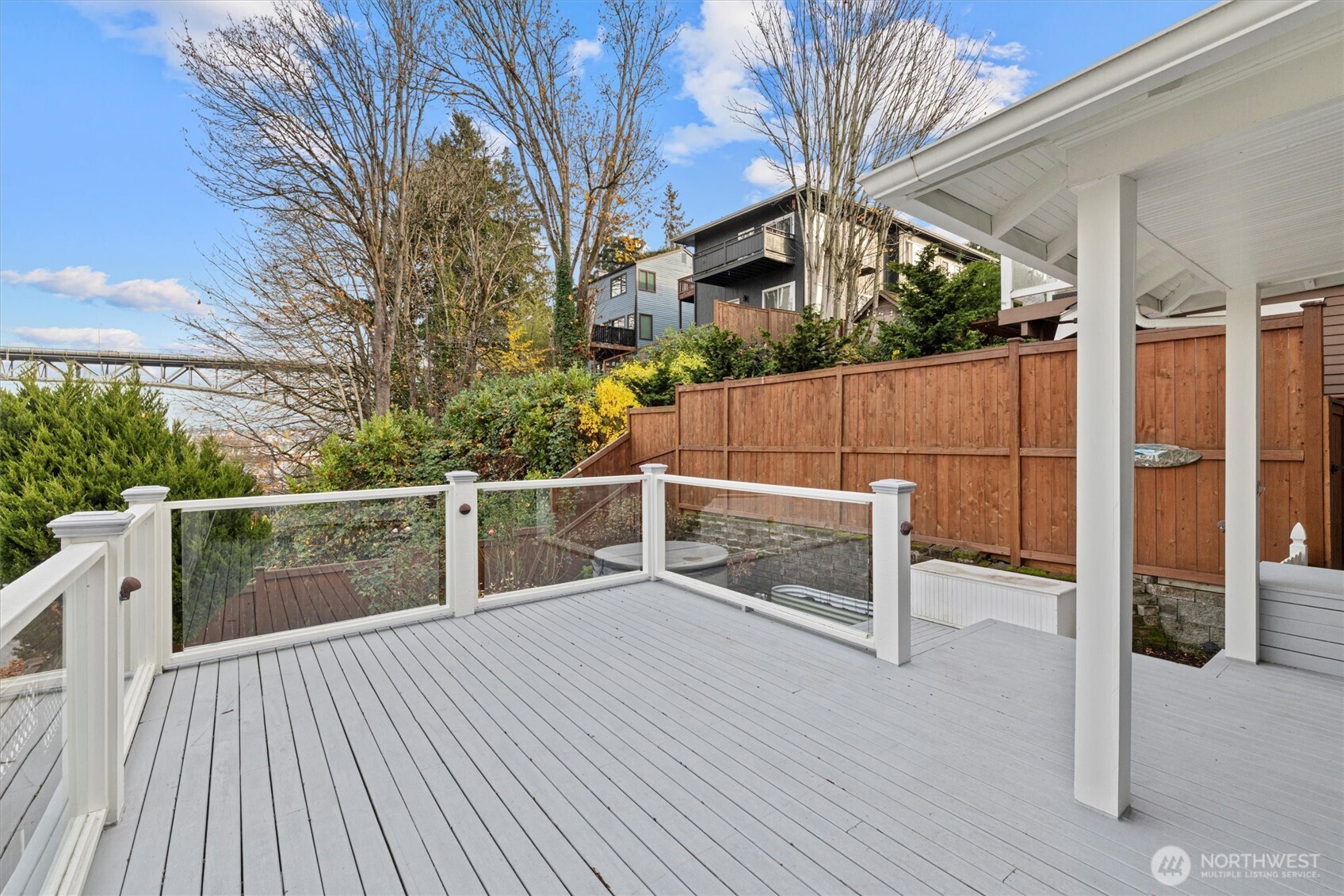 2912 3rd Avenue North Seattle, WA 98109 - Photo 30 of 37 a view of a balcony with wooden floor and fence