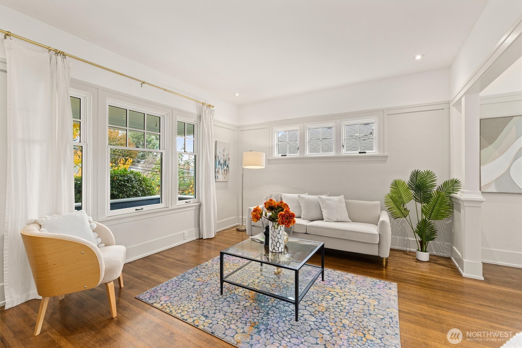 2912 3rd Avenue North Seattle, WA 98109 - Photo 6 of 37 a living room with furniture and a window with garden view