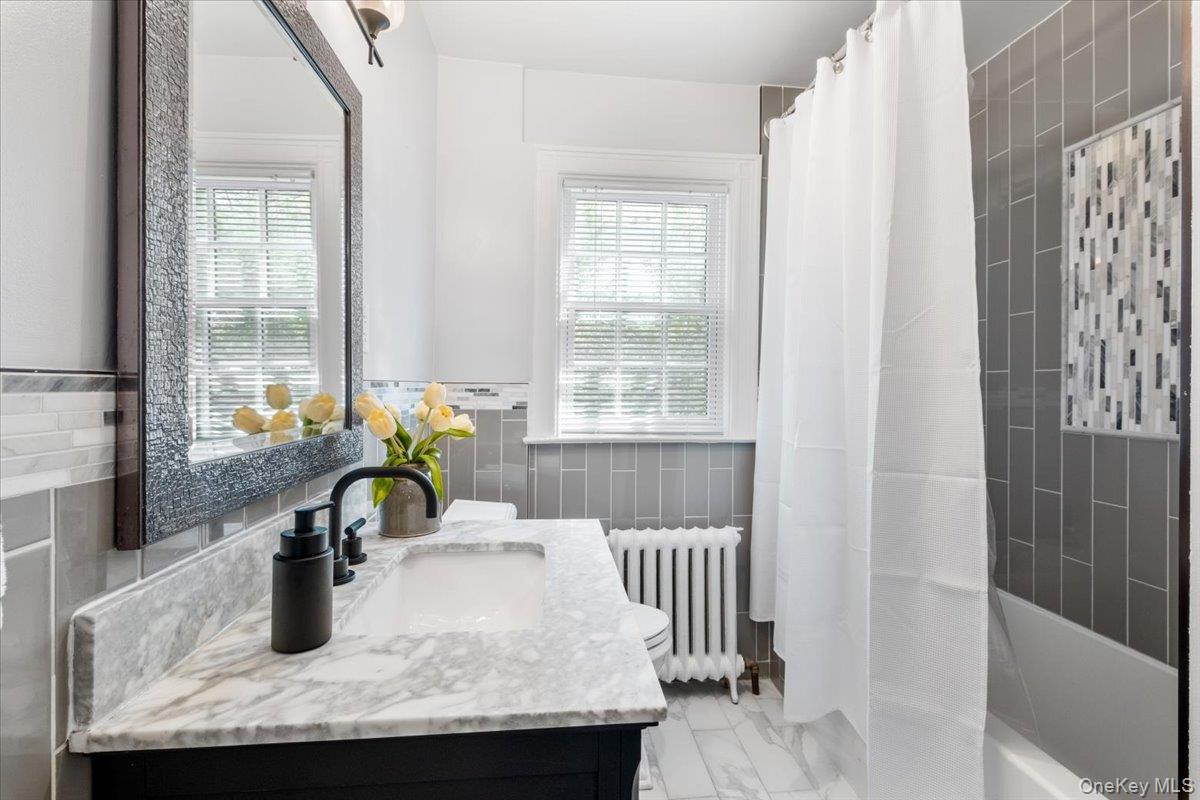 9 Lockwood Road Scarsdale, NY 10583 - Photo 18 of 33 a dining room with furniture and window