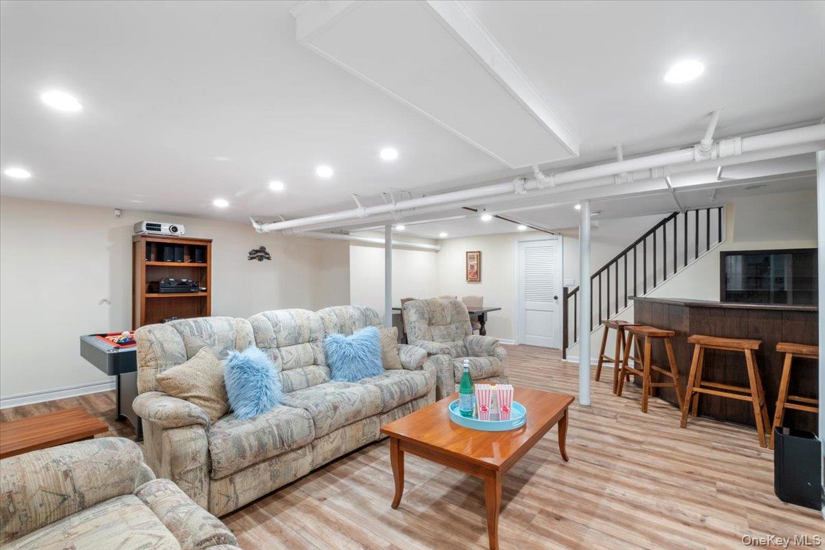9 Lockwood Road Scarsdale, NY 10583 - Photo 23 of 33 a living room with furniture and wooden floor