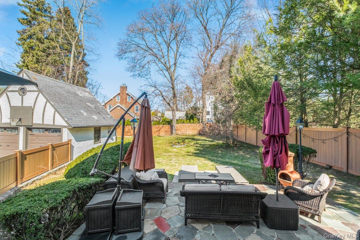 9 Lockwood Road Scarsdale, NY 10583 - Photo 26 of 33 a view of backyard with trampoline
