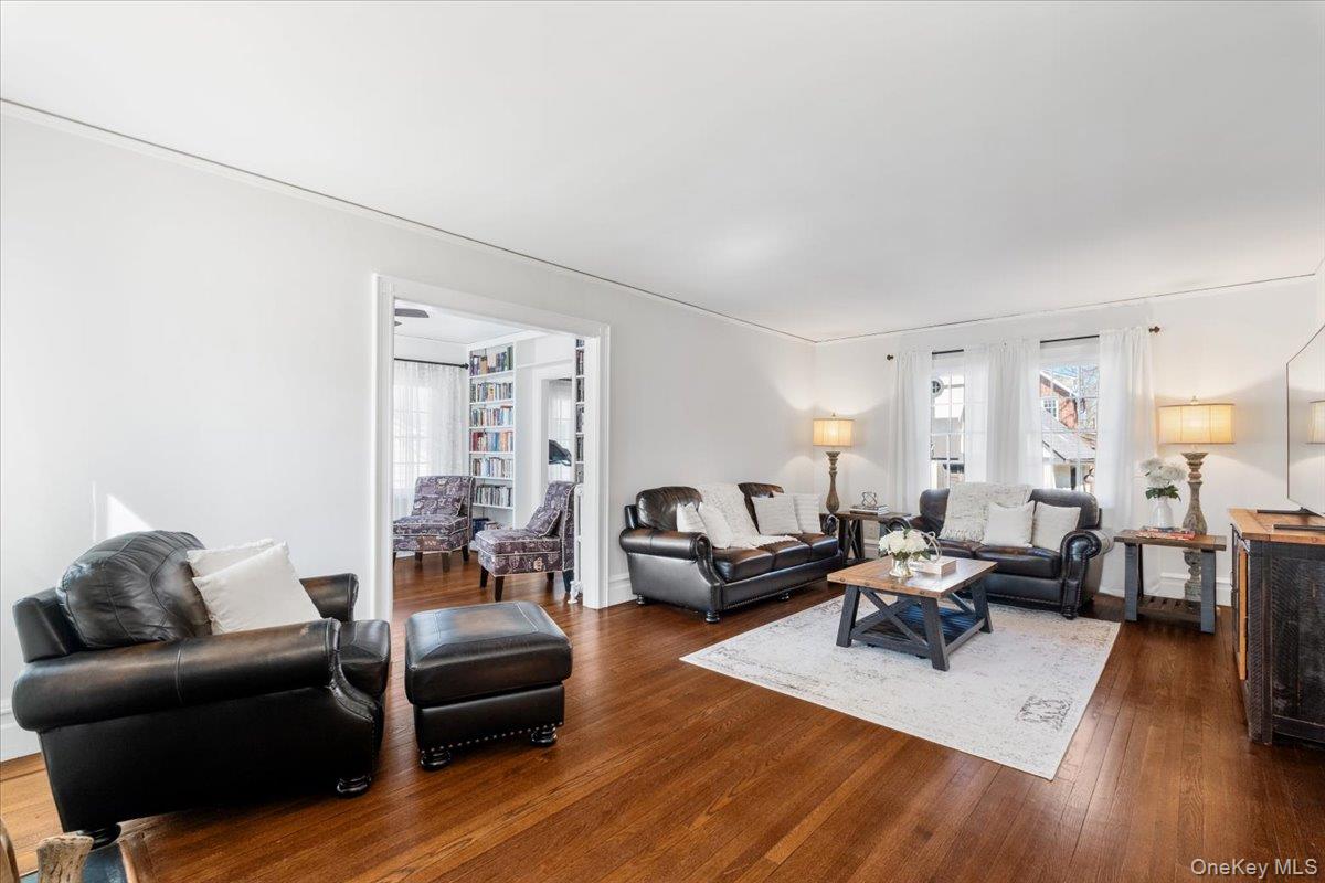 9 Lockwood Road Scarsdale, NY 10583 - Photo 7 of 33 a living room with furniture wooden floor and a large window