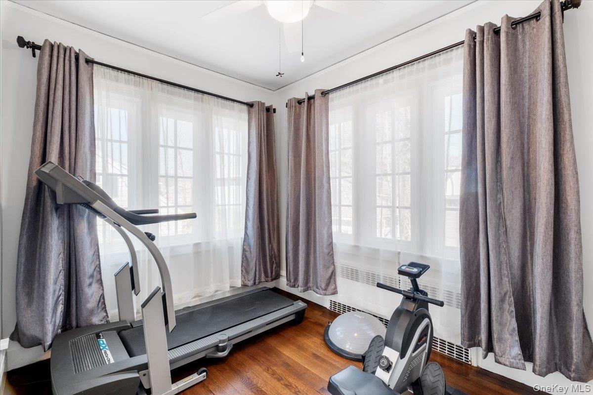 9 Lockwood Road Scarsdale, NY 10583 - Photo 9 of 33 a view of a room with gym equipment