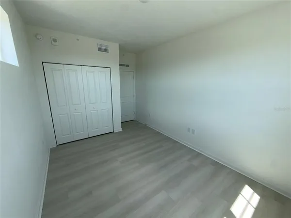 a bathroom with a sink toilet and mirror