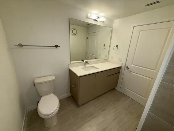 an empty room with wooden floor