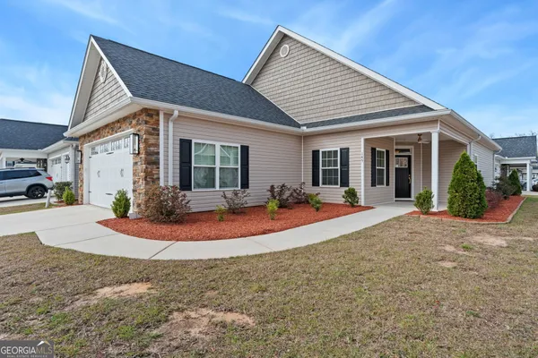 a view of a house with entertaining space