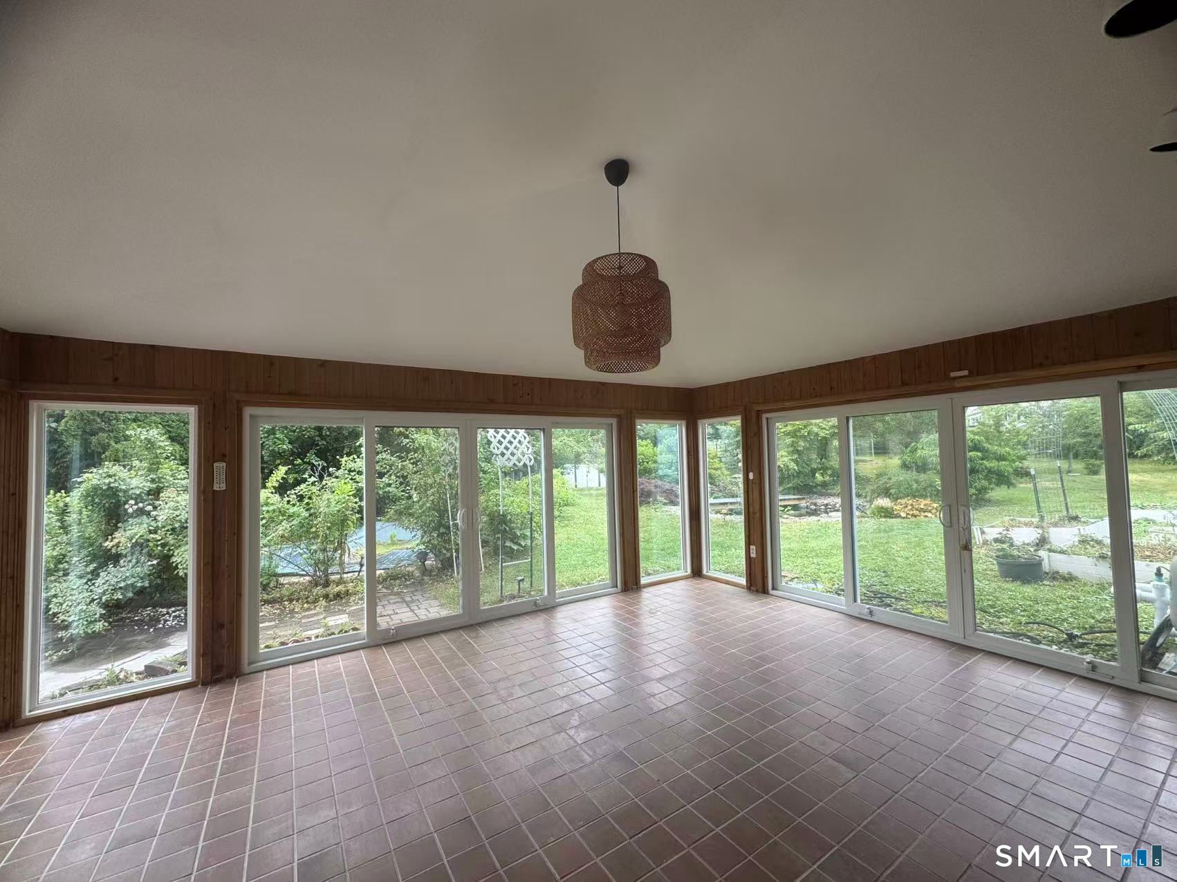 1122 Fienemann Road Farmington, CT 06032 - Photo 7 of 26 a view of room with a large window