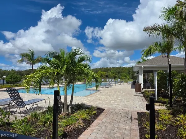 a view of a balcony with furniture