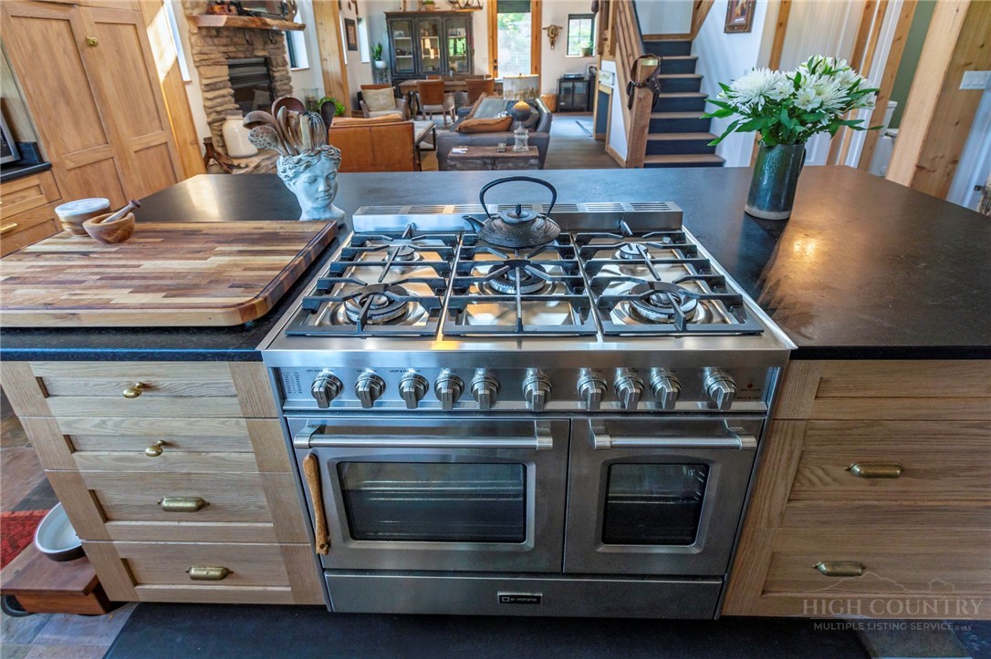 509 Grant Houck Road Todd, NC 28684 - Photo 19 of 43 a stove top oven sitting inside of a kitchen