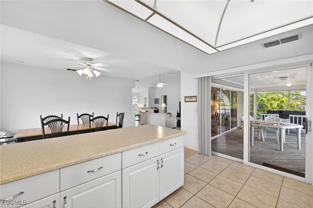a spacious bathroom with a double vanity sink and a mirror