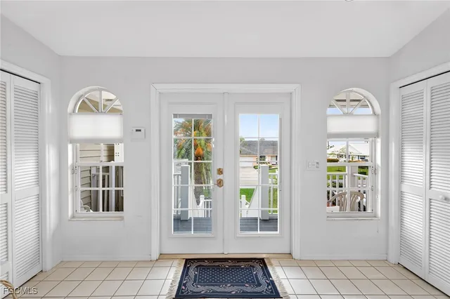 a view of front door with wooden floor